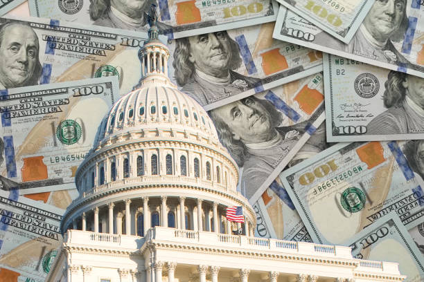 تراجع الدولار وحذر المستثمرين يهيمن على الأسواق الآسيوية مع صعود أسهم تسلا 